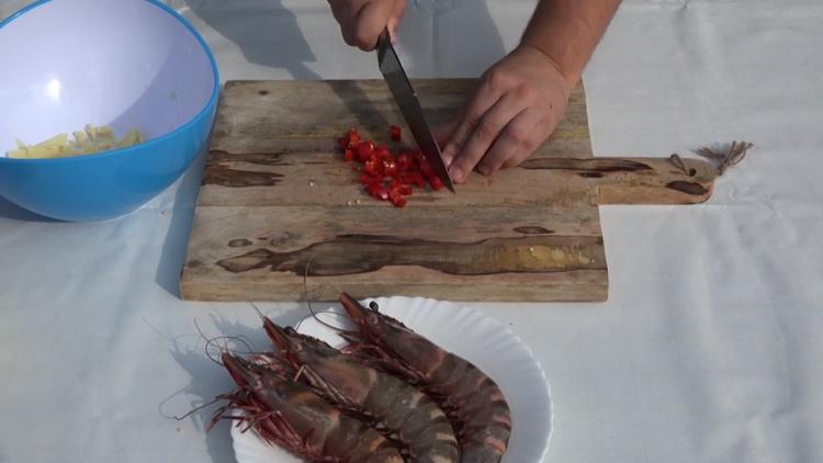 To make tiger shrimp, chop the pepper