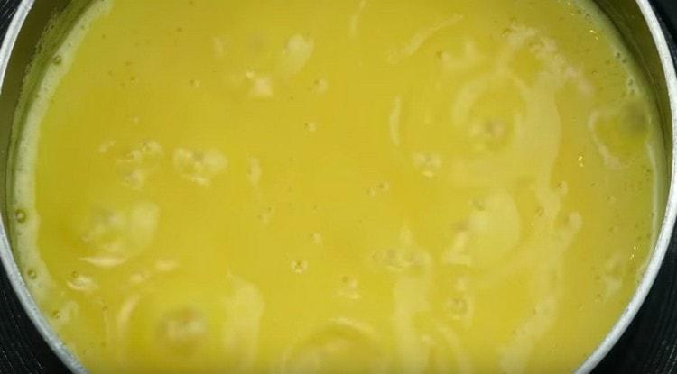 Cook the cream until thickened.