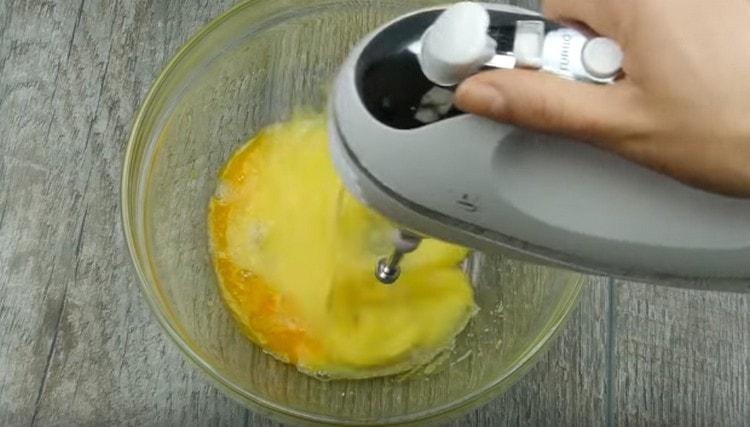 Beat eggs with sugar separately.