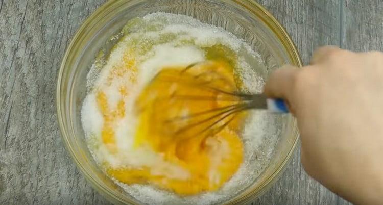 Beat eggs with sugar separately.