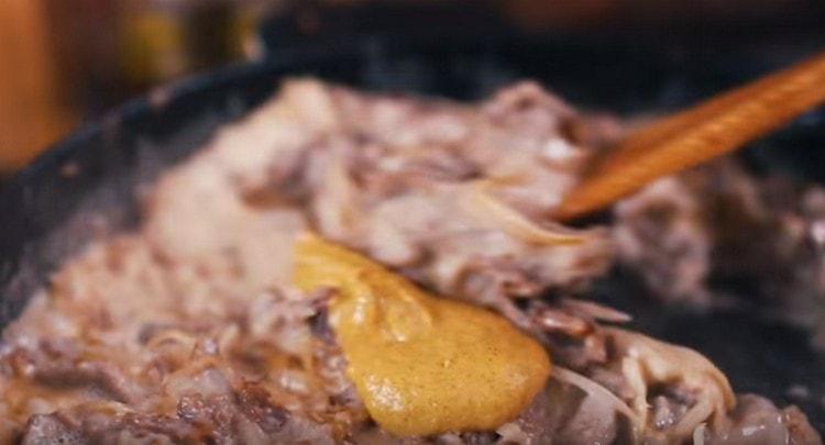 Add mustard, salt and pepper to taste.