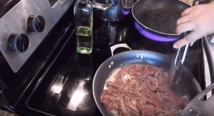 put the liver on one pan and fry on both sides.