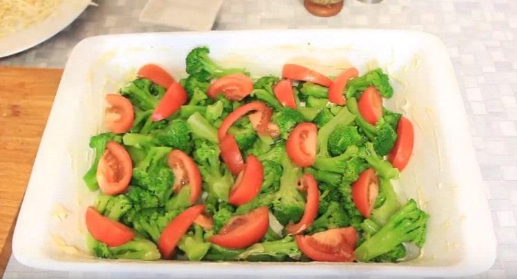 Lay the tomatoes on top of the broccoli.