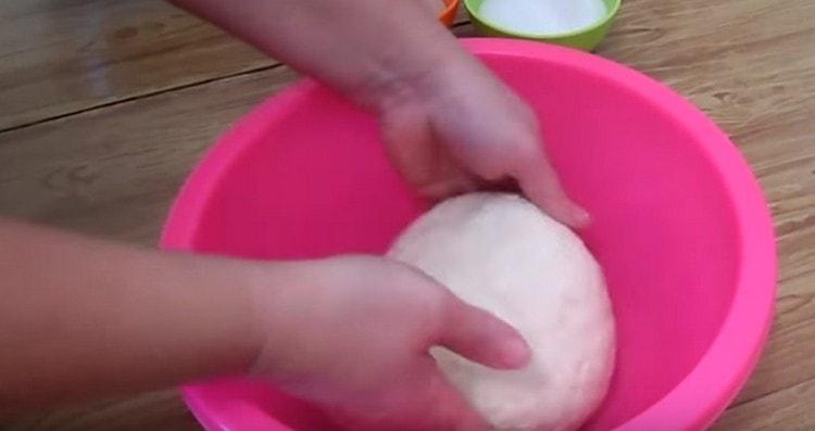 Knead the soft dough.