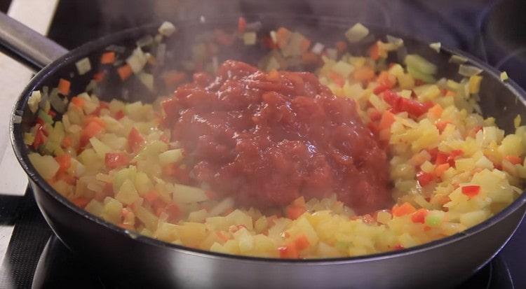Next, add chopped tomatoes.