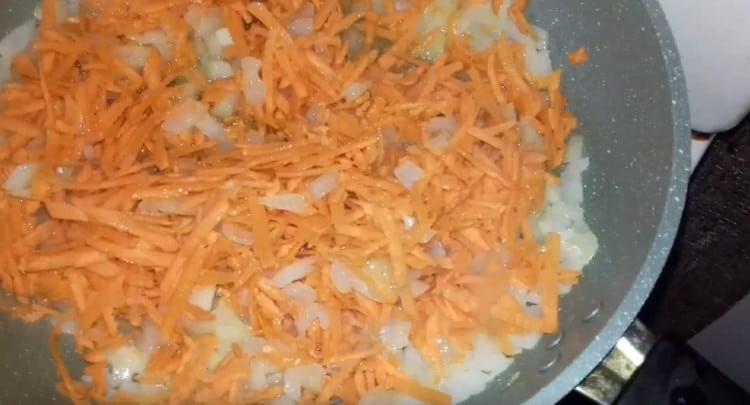 Add carrots to the onion.