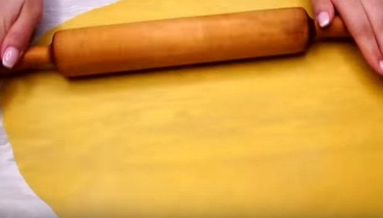 Roll out each part of the dough thinly.