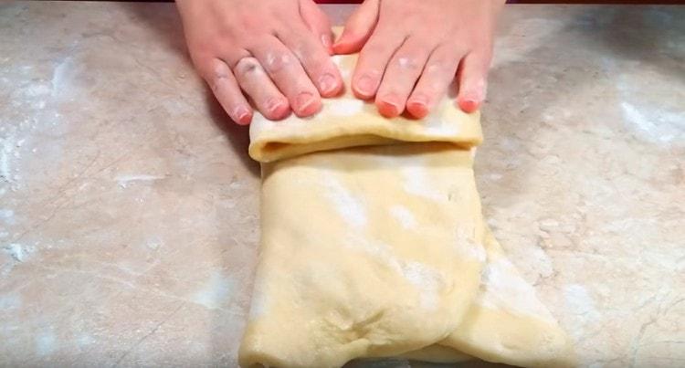 Fold the dough three times, and then again the same way.