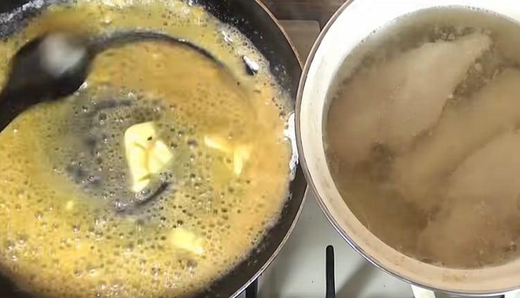 Add a piece of butter to the flour and let it melt.