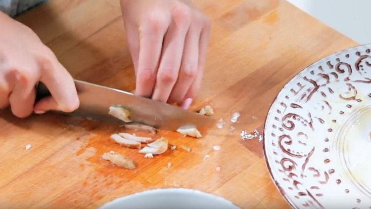 Cut into pieces fried chicken.