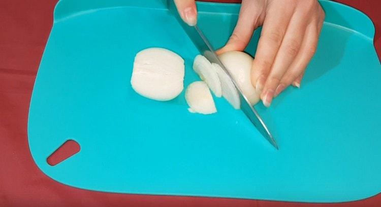 Cut the onion in half rings