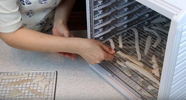 We install squid grates in the dryer and turn it on for 3-5 hours.