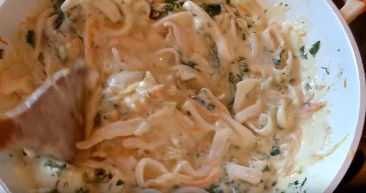 Add chopped greens to the dish.