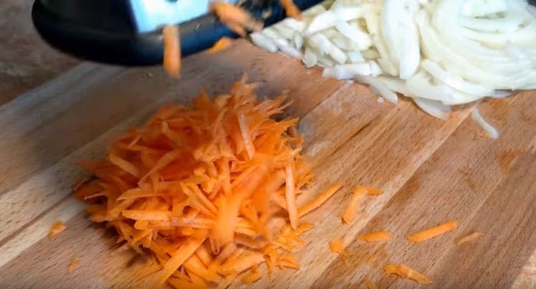 Grate carrots.