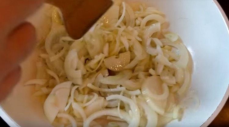 Fry onion in butter until soft.