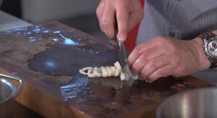 Cut the squids themselves.