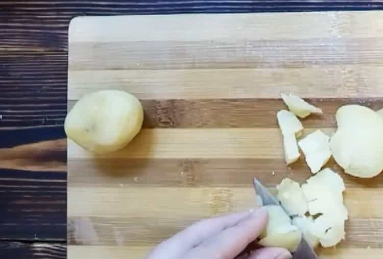 To cook okroshka, chop the potatoes