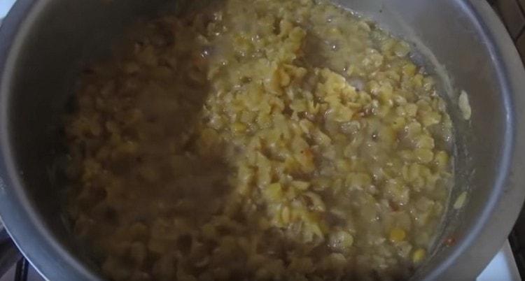 Check lentils for readiness.