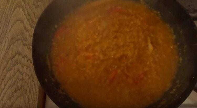 Transfer the boiled lentils to the vegetables and mix.