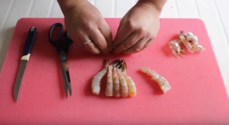 use your fingers to level the shrimp.