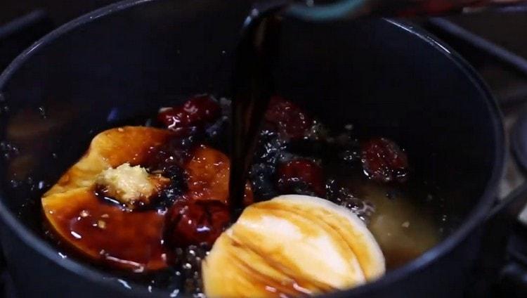 Add water, soy sauce.