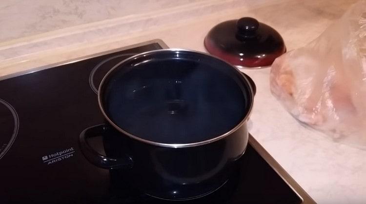 In a saucepan, bring the water to a boil.