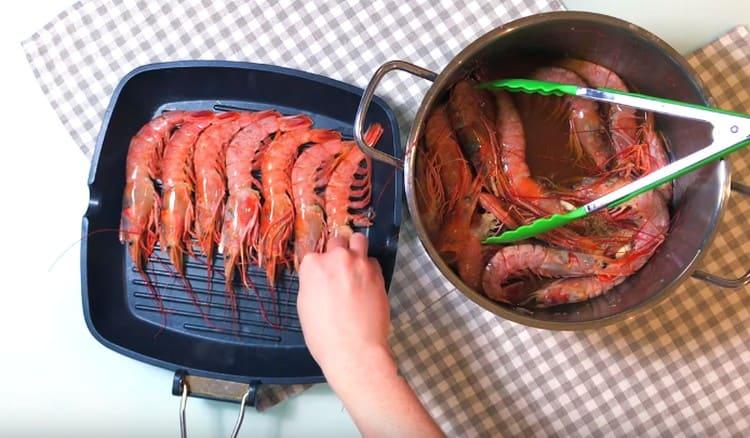 We spread the shrimp in a heated grill pan in one layer.