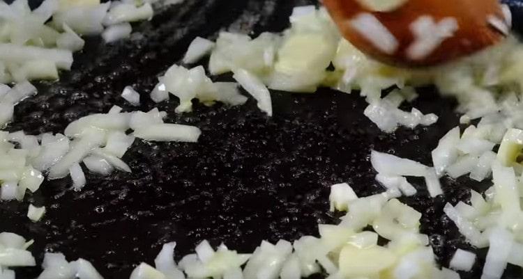 Fry onion and chopped garlic in butter.