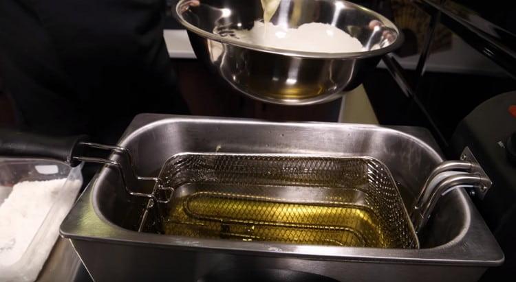 We heat the vegetable oil.