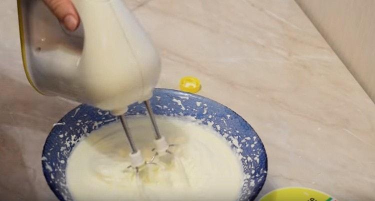 Whip the cream to persistent peaks.