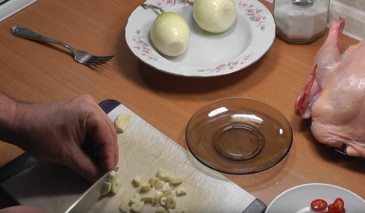 We also chop the garlic.