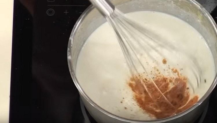 We add nutmeg to the bechamel sauce.