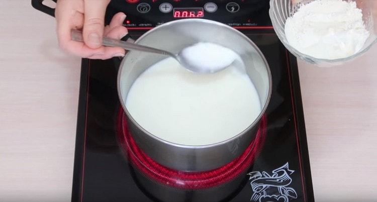 We take a little hot milk and mix it with flour.