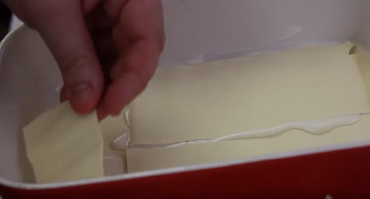 Next, lay out the sheets of lasagna.