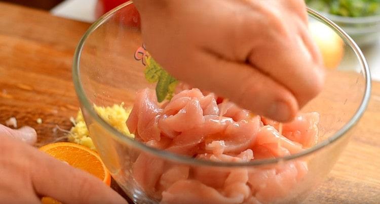 Marinate chicken fillet in orange juice with ginger.