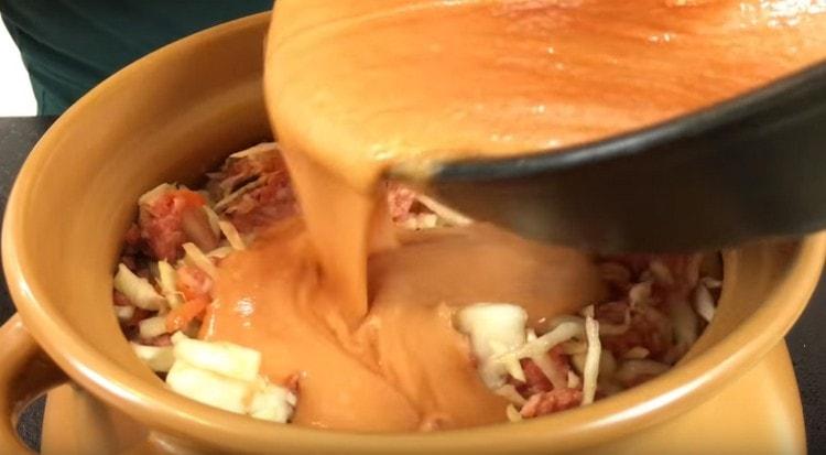 Top the ingredients with sauce.