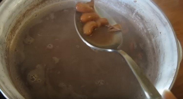 Check the readiness of the beans.