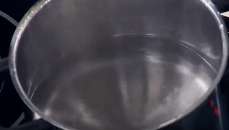 In a saucepan, bring the water to a boil.
