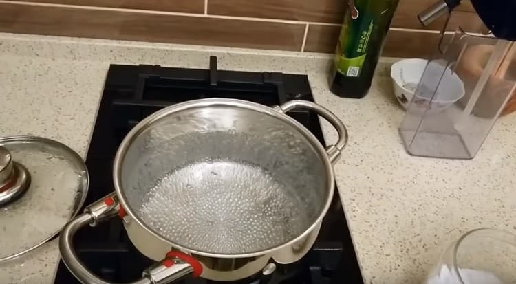 Bring water to a boil, add salt.
