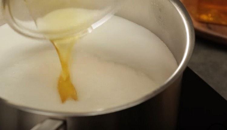 Add a pinch of salt and honey to the milk.