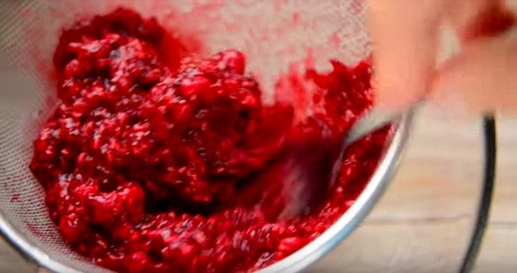 Rub raspberries through a sieve.