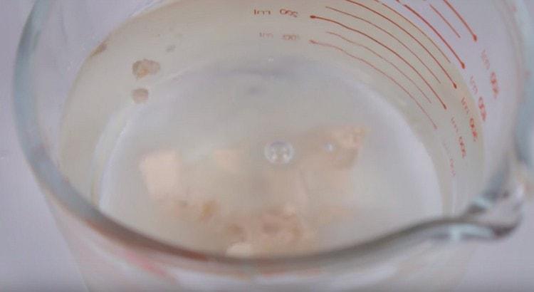 Dissolve yeast in warm water.