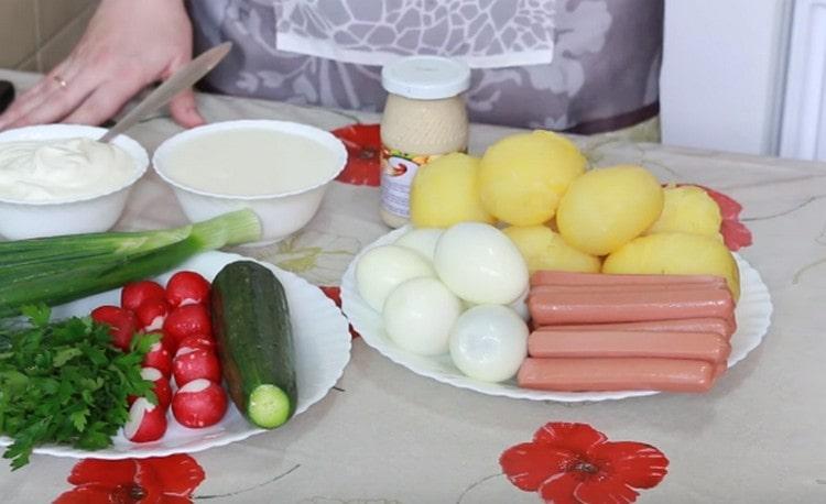 Boil eggs and potatoes, peel them.
