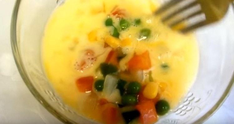 Add frozen vegetables to one of the servings.