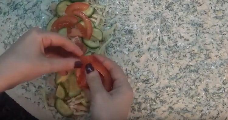 We spread all the prepared components on one side of the pita bread.