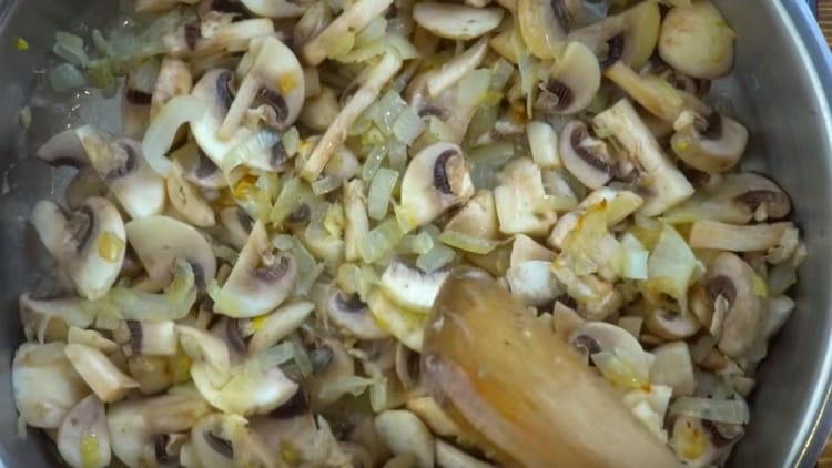 Next, add sliced mushrooms.