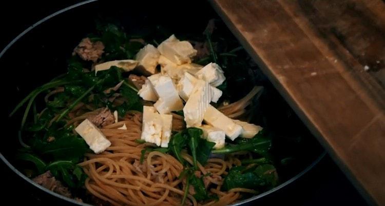 Add also the pieces of feta cheese.