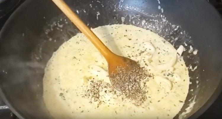 Next, add the cream, as well as black pepper.