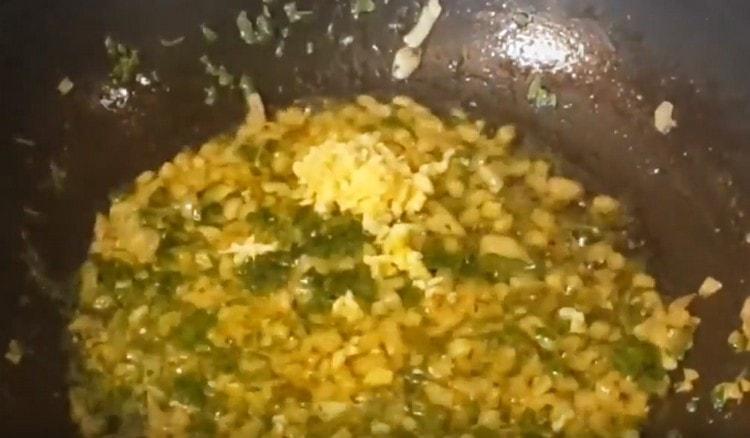 Then add garlic to the pan.