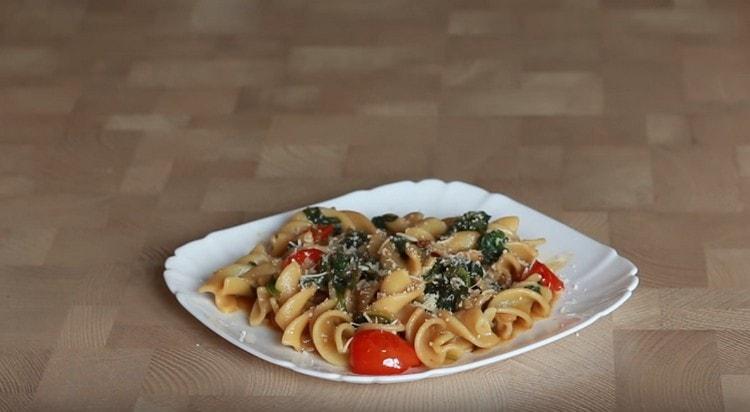 Spinach pasta will be even tastier if served with grated parmesan.